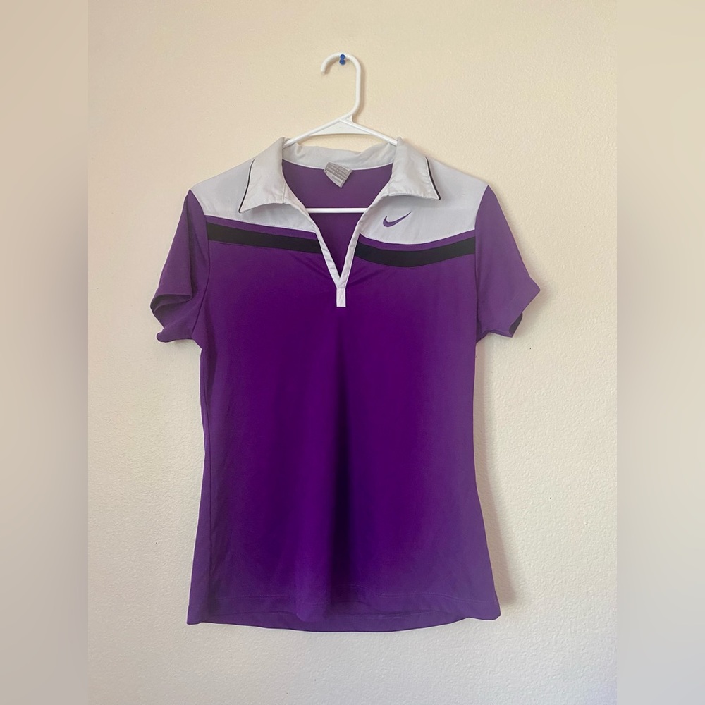 A purple Nike Shirt